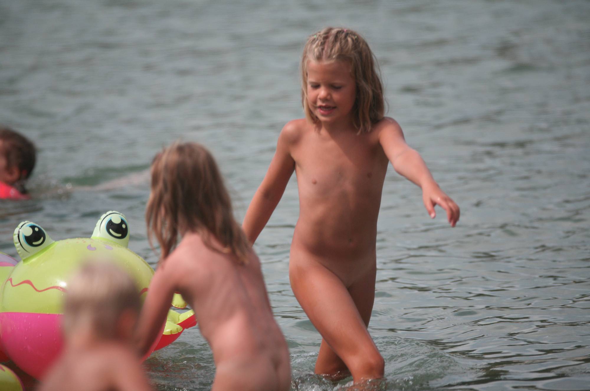 Nudist Kids On Floatables - Purenudism Family - 1